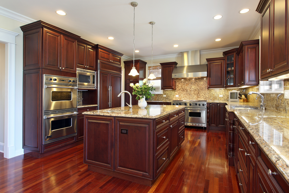 Kitchen with cherry wood cabinetry kitchen cleaning